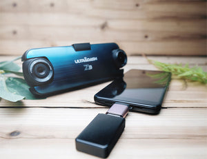 行車紀錄器Z3與手機插SD卡插在OTG裝置平放在桌上